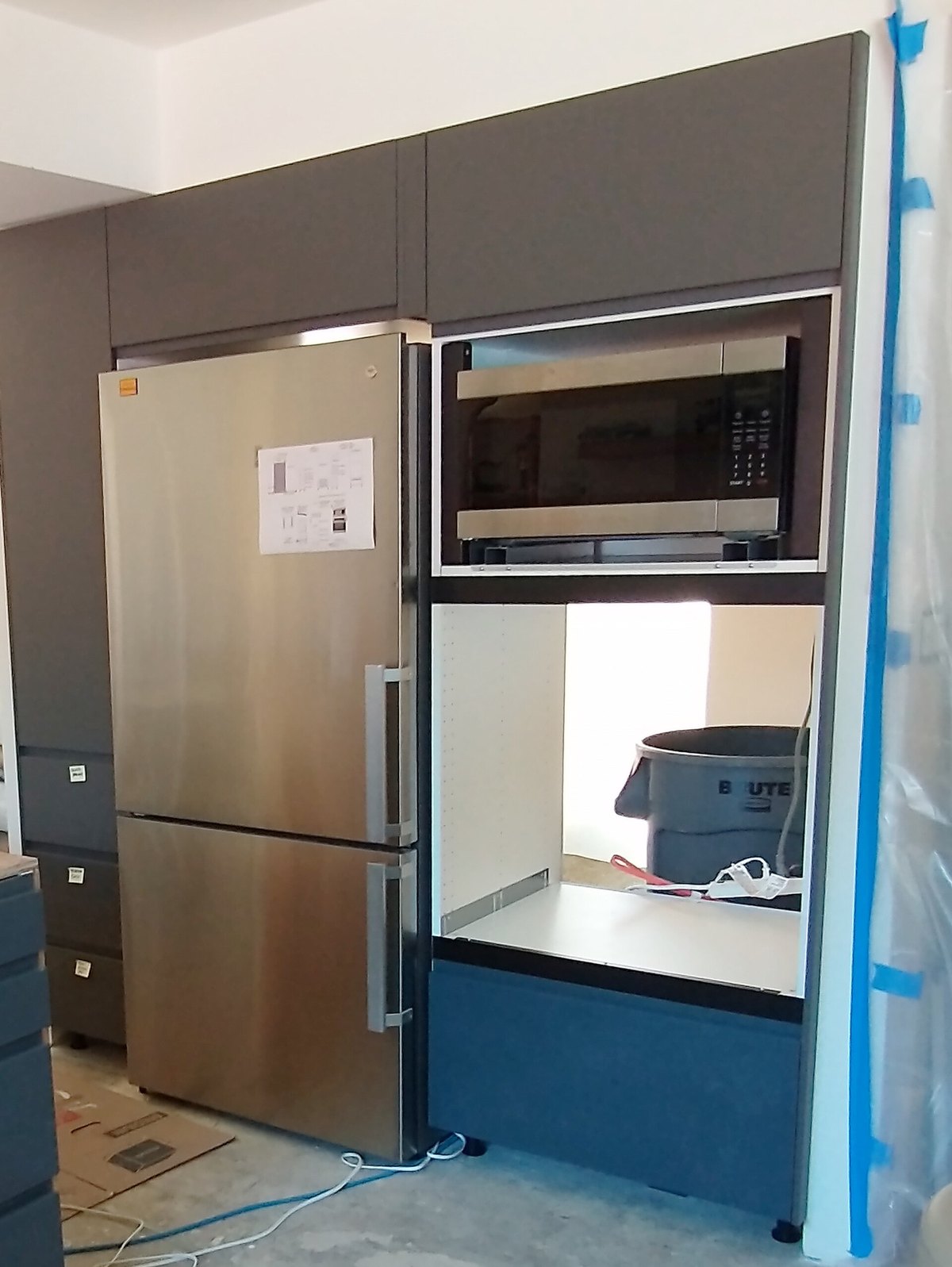Built-in kitchen appliances and cabinetry during installation