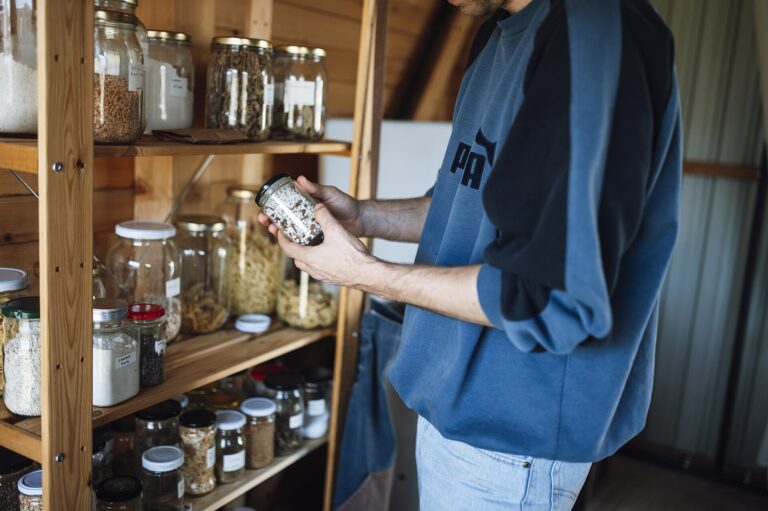 organised pantry cupboard food jars